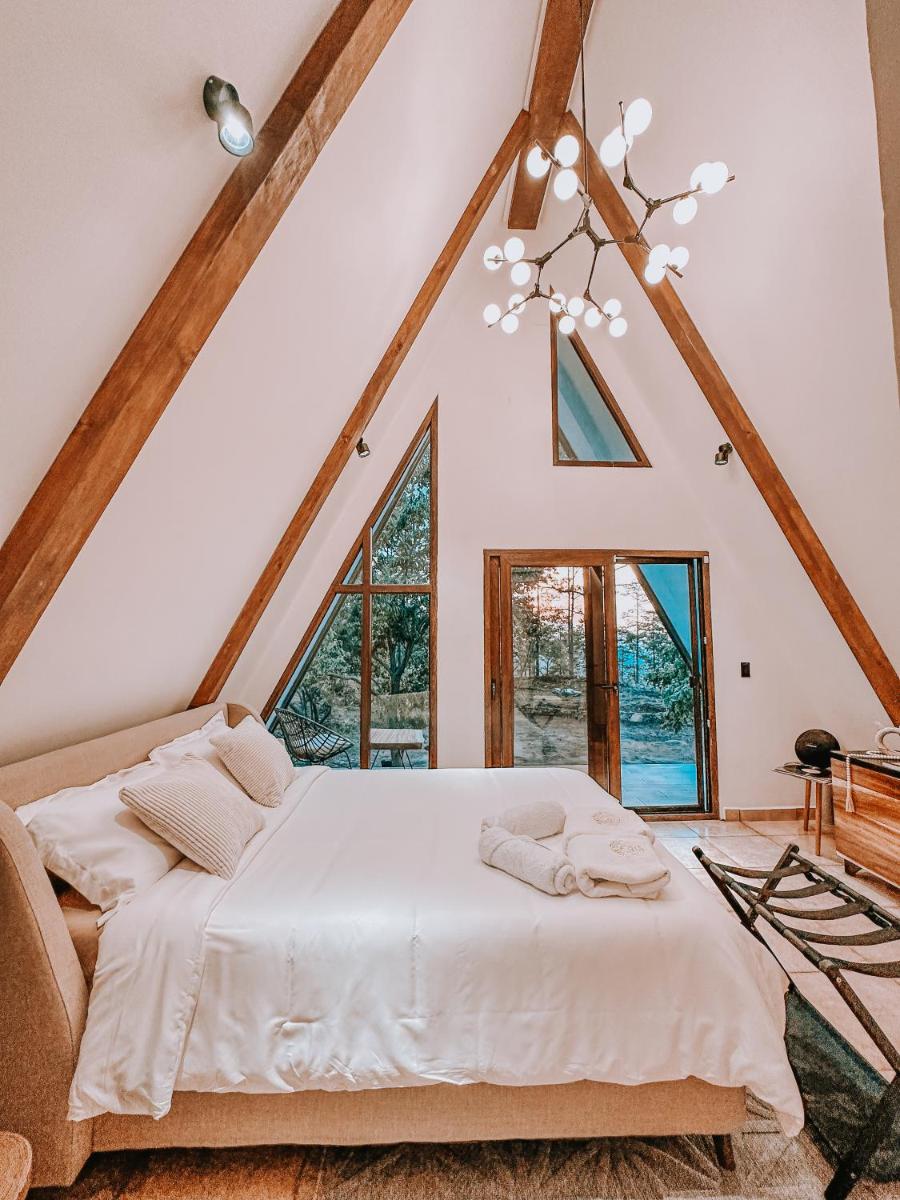 Tiny Pines A-Frame Cabin, Domes and Luxury Glamping Site - Housity