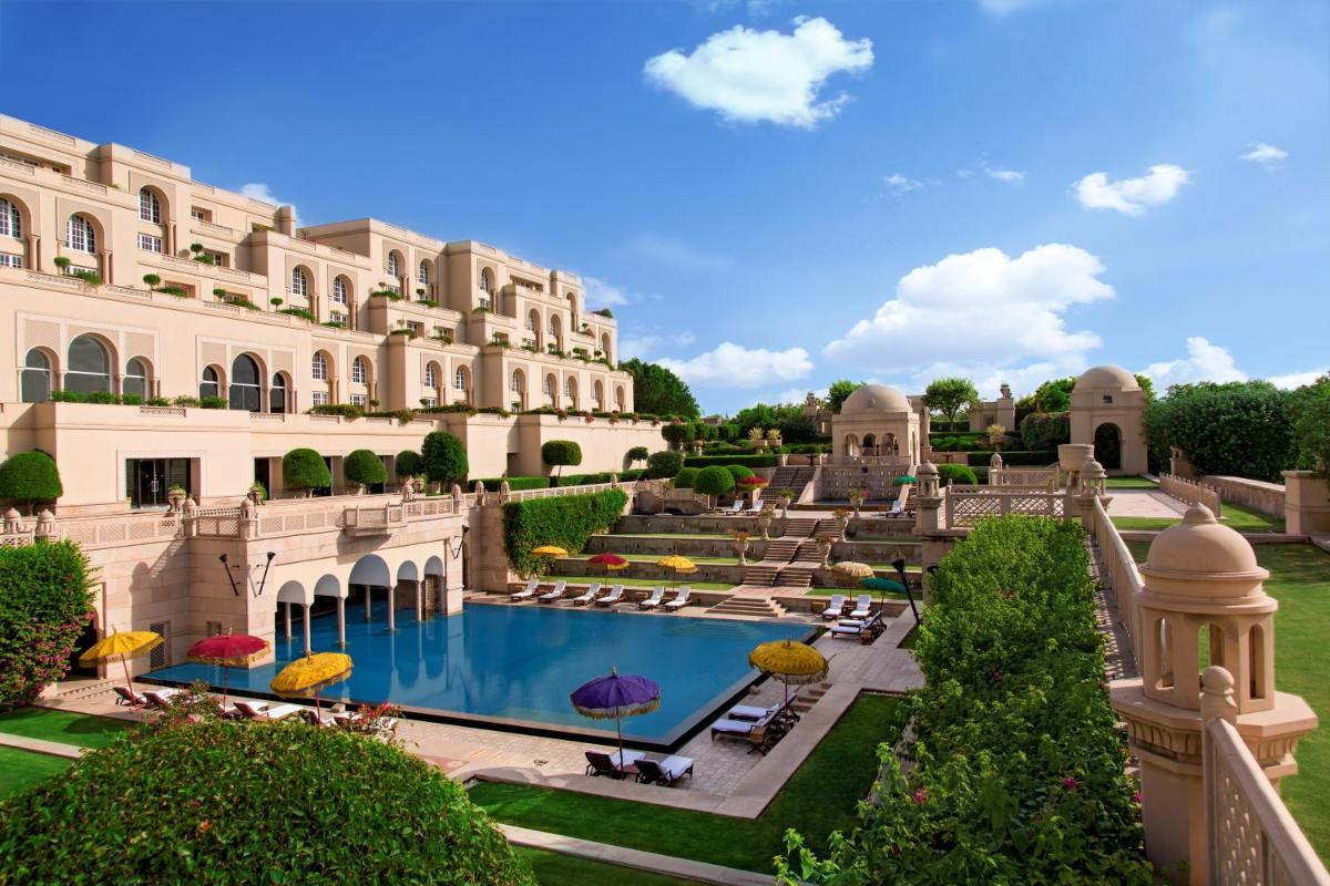 a view of a building with a swimming pool at The Oberoi Amarvilas Agra in Agra