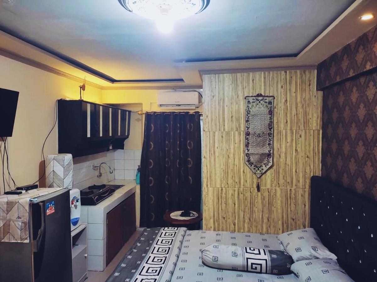 Lily's Room At Apartemen Cibubur Village By FPH - Housity