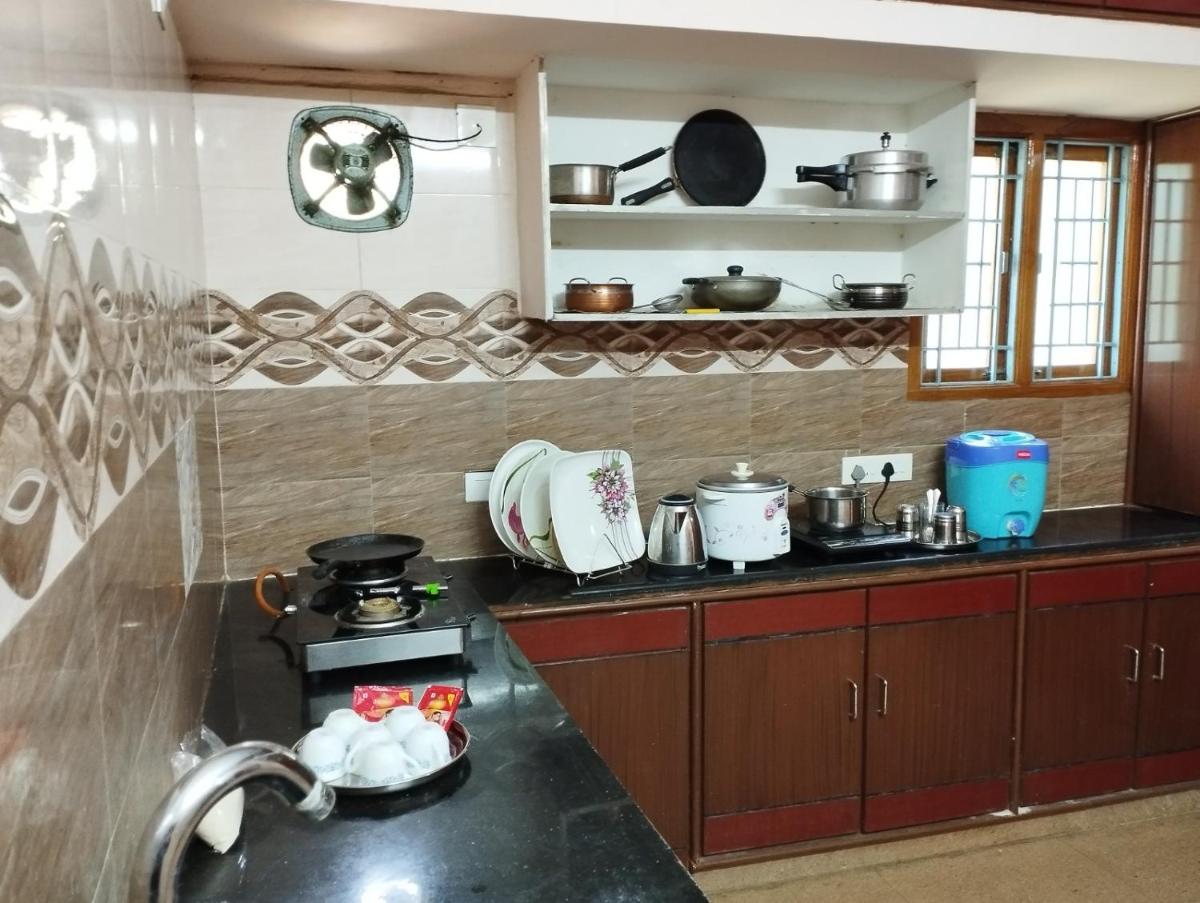 Suitetrails - SLS HOMESTAY - Luxury AC Service Apartments 1BHK, 2BHK, 3BHK - Direct Flyover to Alipiri Tirumala Gate - Walk to PS4 Pure Veg Restaurants, Supermarkets - Near to National Highway & Padmavathi Amma Temple - Modular Kitchen, Living room -Free Superfast Wifi
