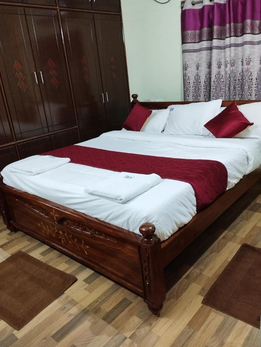 Suitetrails - SLS HOMESTAY - Luxury AC Service Apartments 1BHK, 2BHK, 3BHK - Direct Flyover to Alipiri Tirumala Gate - Walk to PS4 Pure Veg Restaurants, Supermarkets - Near to National Highway & Padmavathi Amma Temple - Modular Kitchen, Living room -Free Superfast Wifi