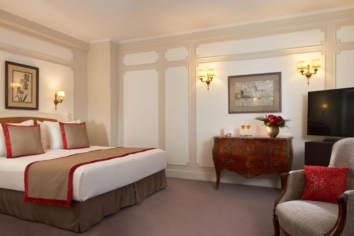 Un ou plusieurs lits dans un hébergement de l'établissement Majestic Hotel Spa - Champs Elysées