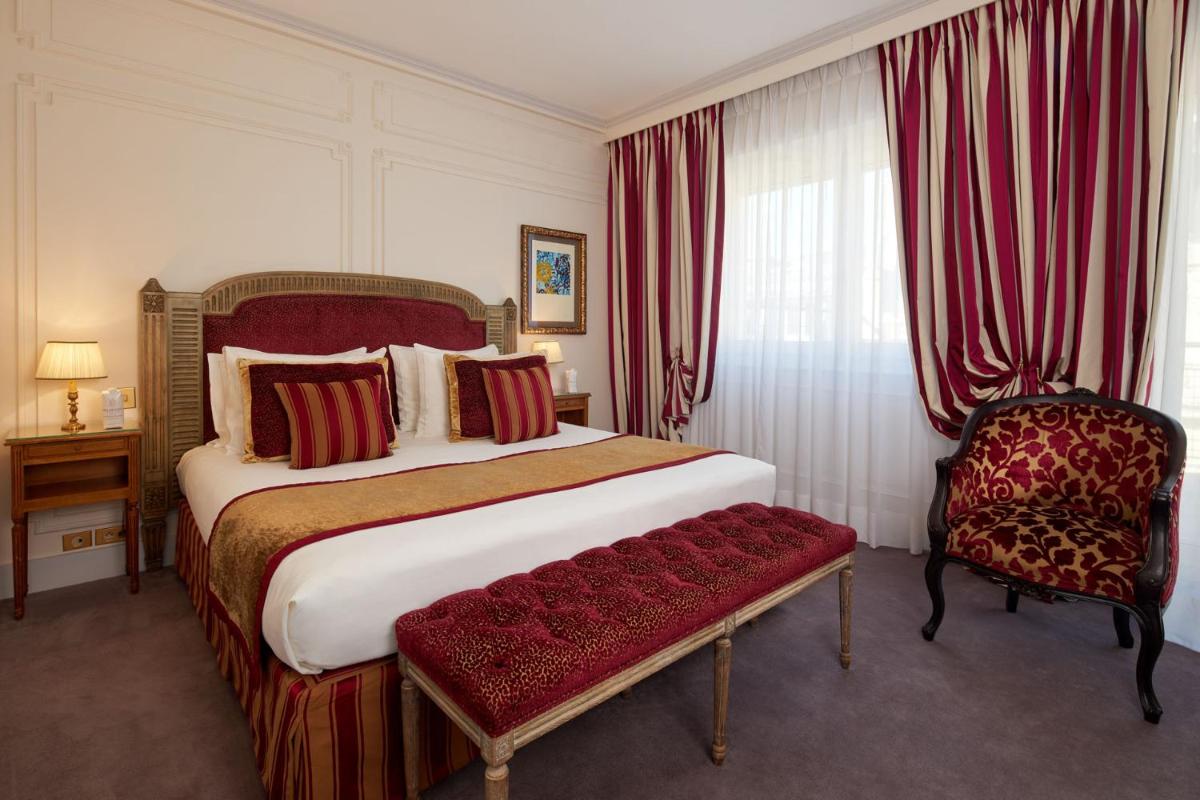 Un ou plusieurs lits dans un hébergement de l'établissement Majestic Hotel Spa - Champs Elysées