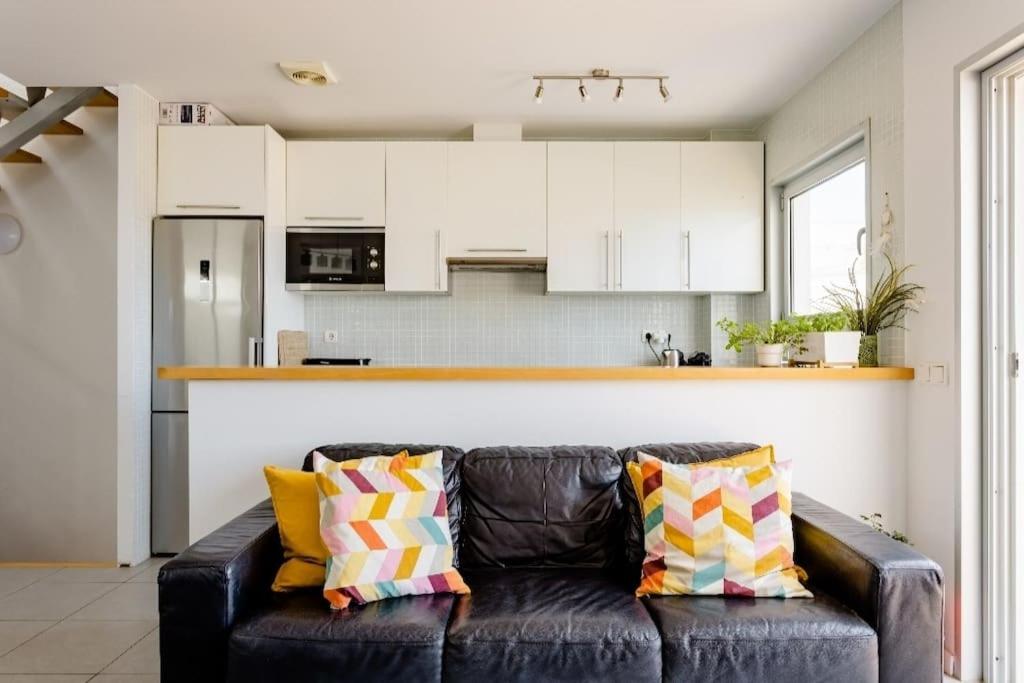 El Médano Beachfront Triplex Penthouse with pool, rooftop, sea view - Housity