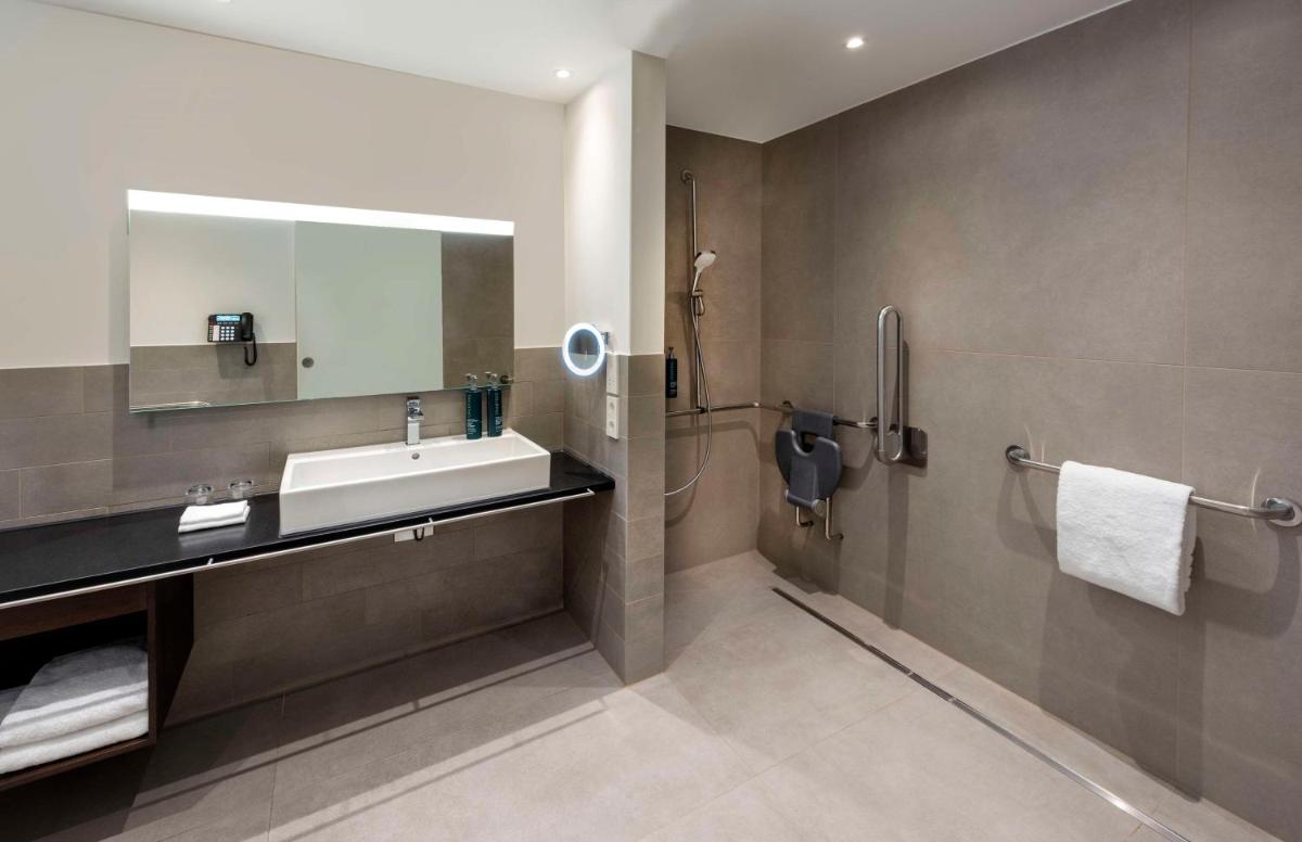 Ein Badezimmer in der Unterkunft Hilton Mainz Ein Badezimmer in der Unterkunft Hilton Mainz