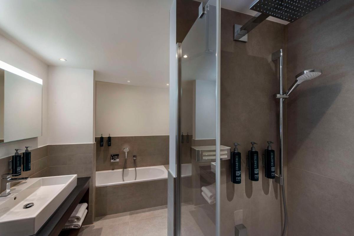 Ein Badezimmer in der Unterkunft Hilton Mainz Ein Badezimmer in der Unterkunft Hilton Mainz