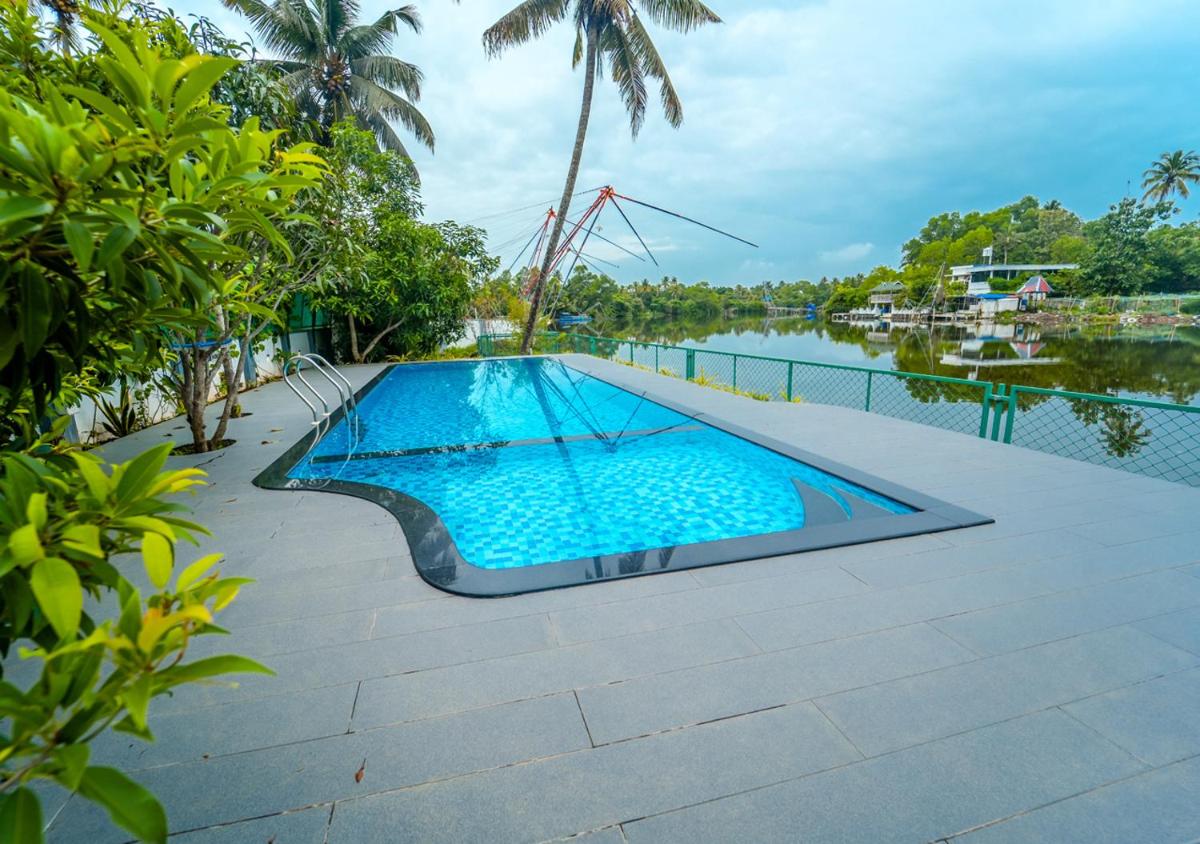 La Riva Lakeside Private Pool Villa Kochi by VOYE HOMES - Housity