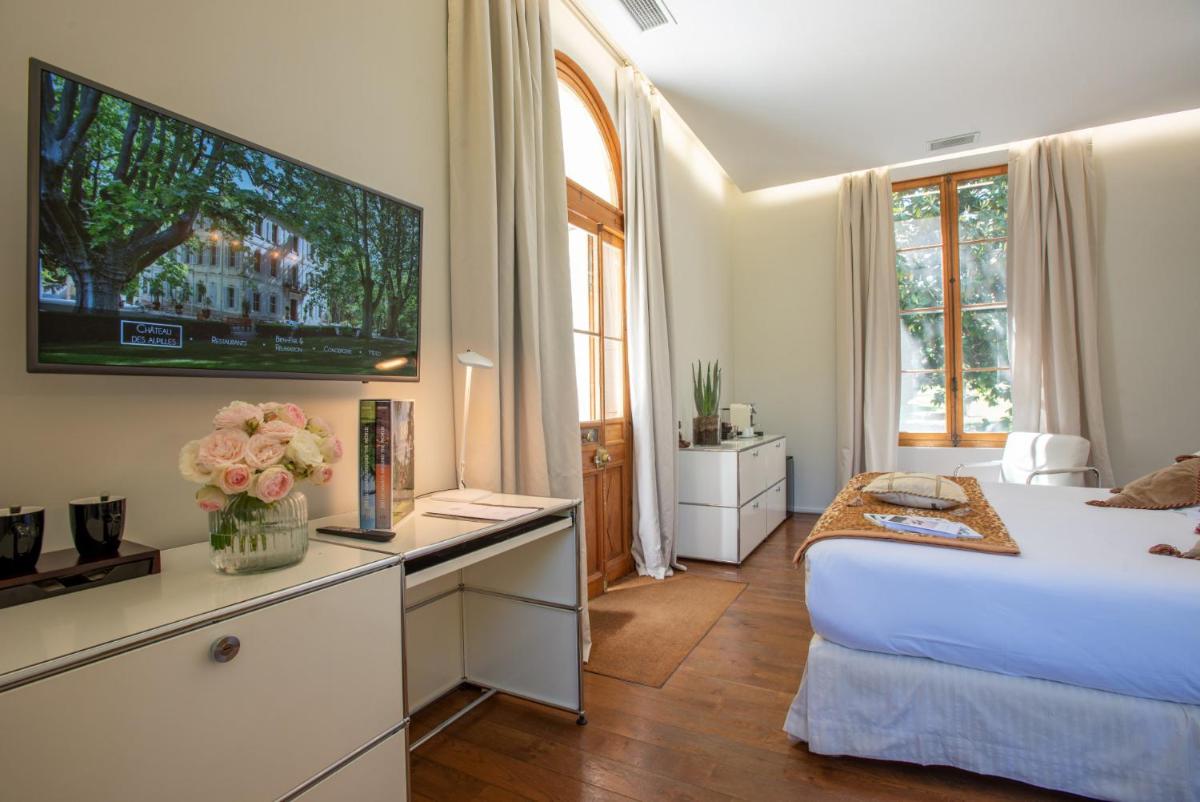 Un ou plusieurs lits dans un hébergement de l'établissement Hotel Château Des Alpilles