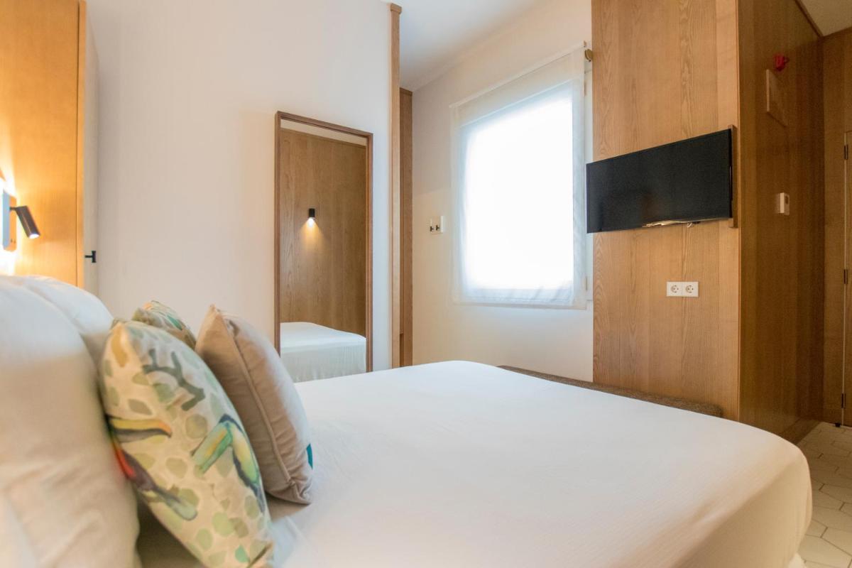 Cama o camas de una habitación en Boutique Hotel Sant Roc & Spa