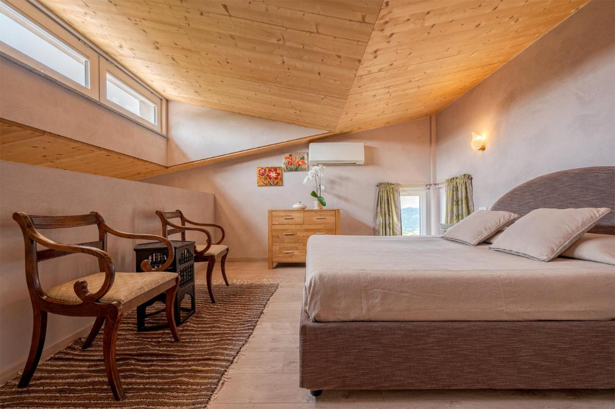 La Rosa Gialla Bio Apartments & rooms - Housity
