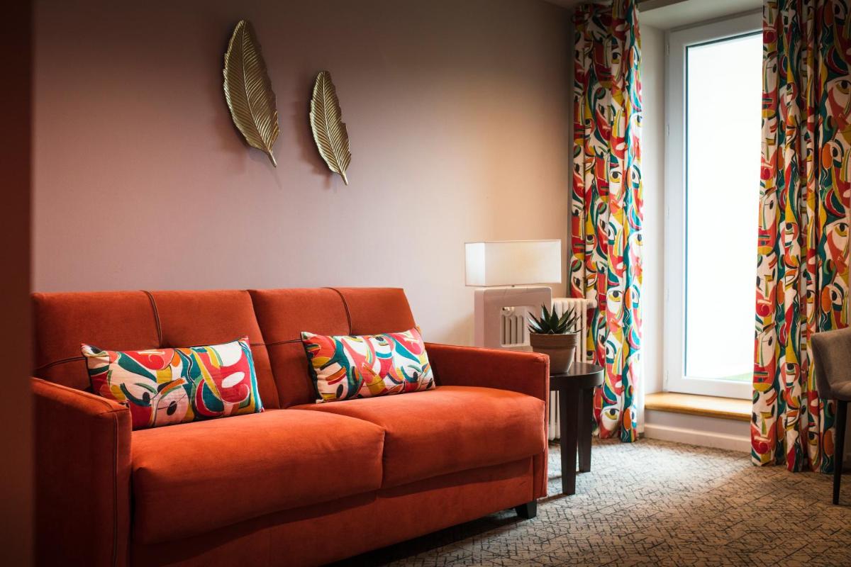 Coin salon dans l'établissement Maison Doucet - Relais & Châteaux