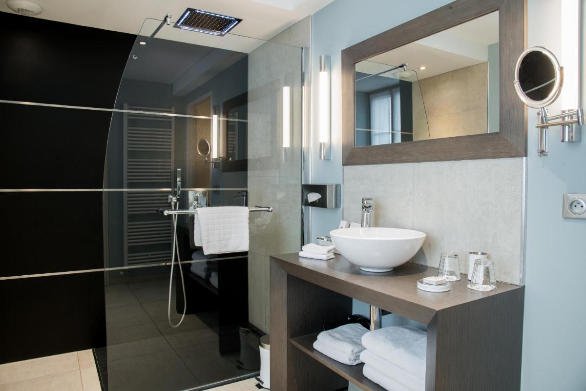 Salle de bains dans l'établissement Maison Doucet - Relais & Châteaux