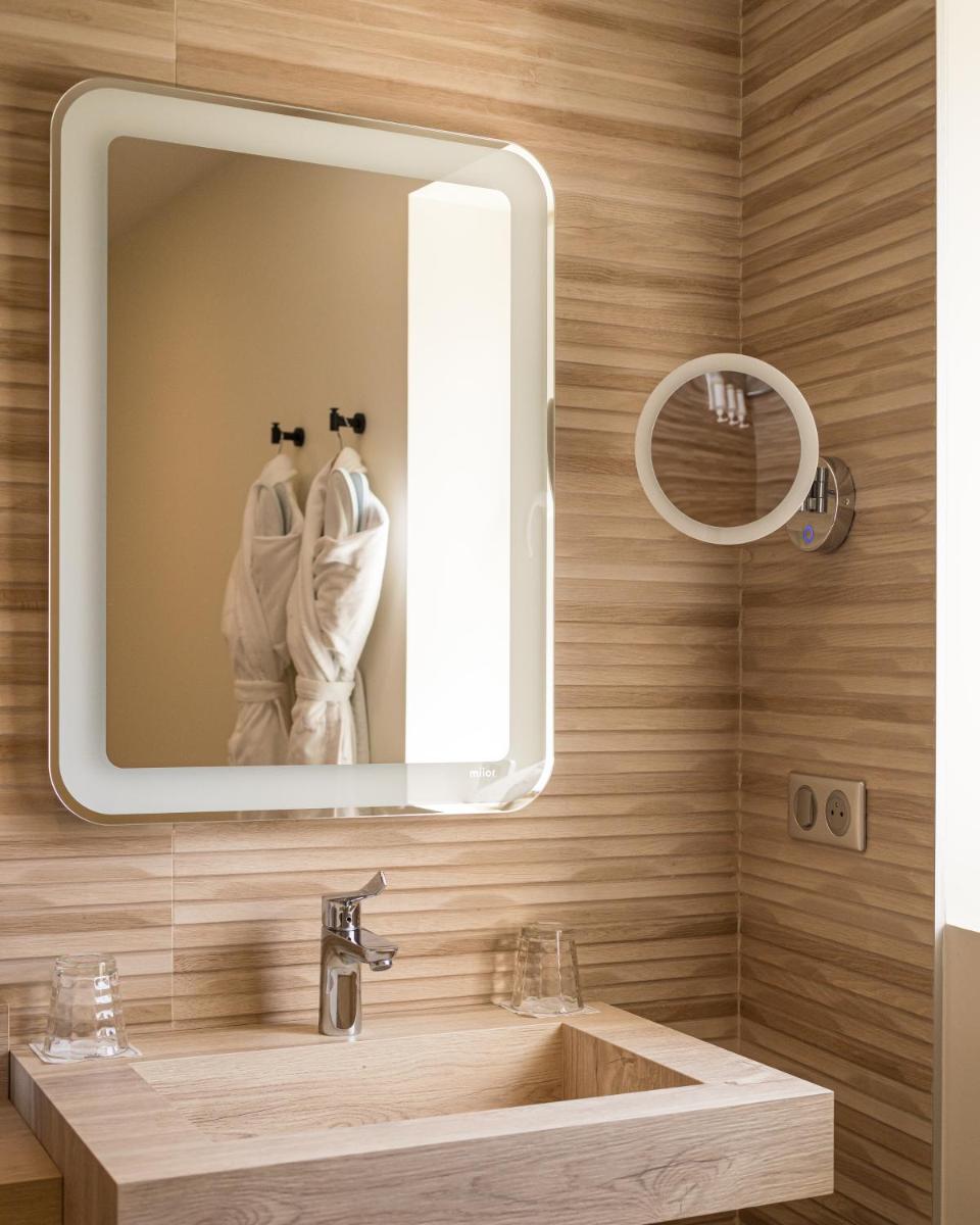 Salle de bains dans l'établissement Maison Doucet - Relais & Châteaux
