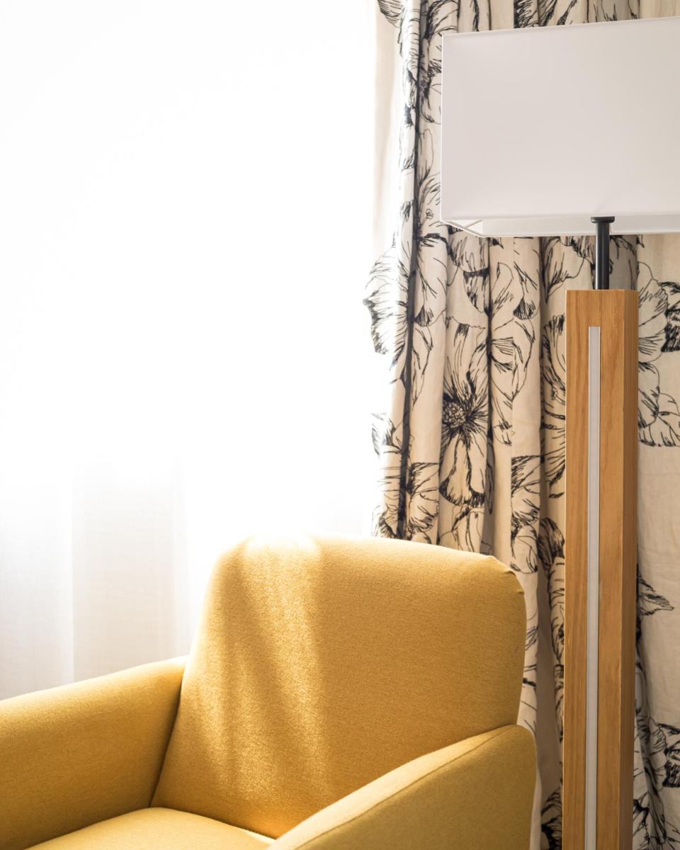 Coin salon dans l'établissement Maison Doucet - Relais & Châteaux