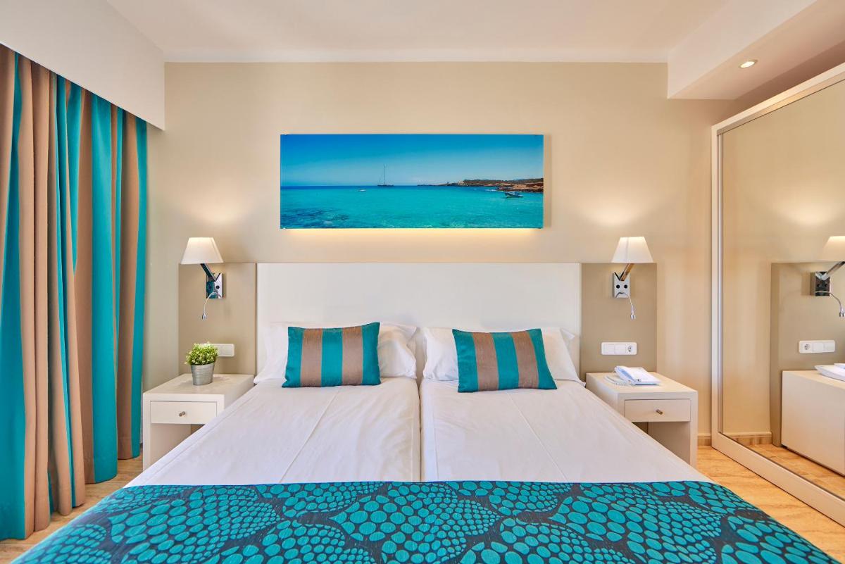 Cama o camas de una habitación en Universal Hotel Lido Park & Spa