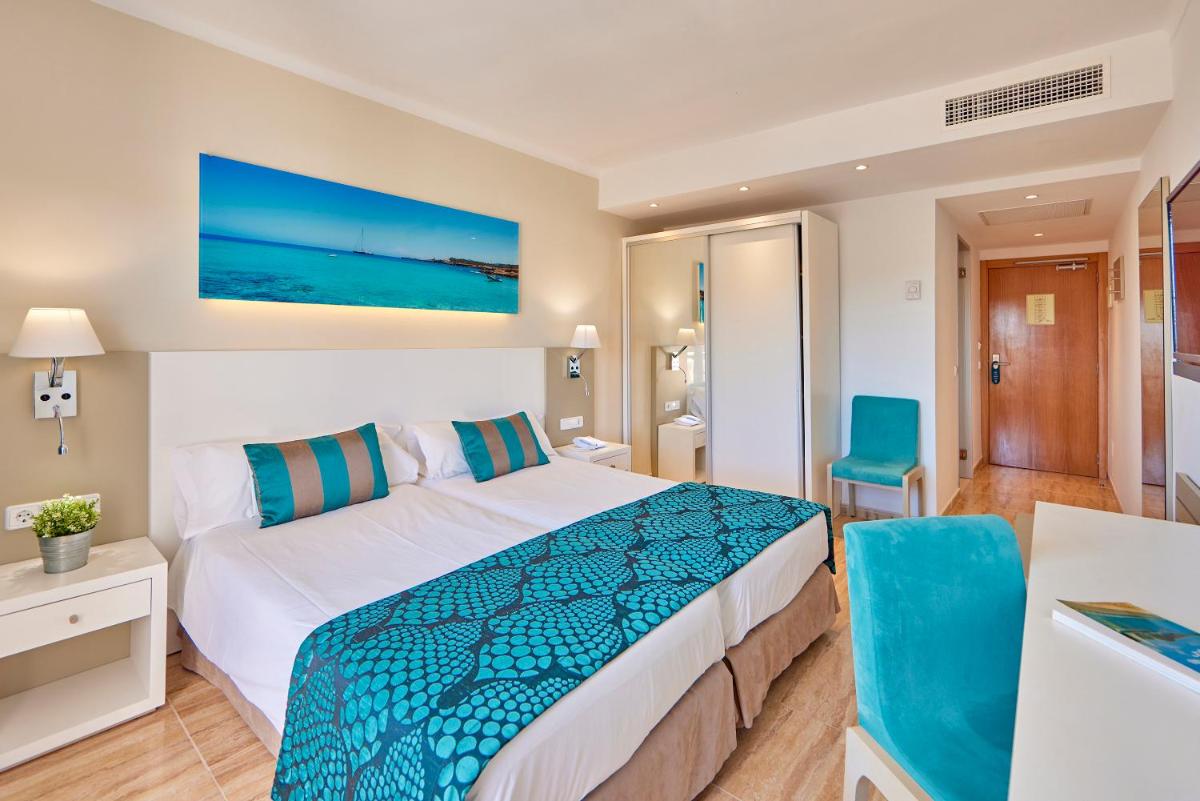 Cama o camas de una habitación en Universal Hotel Lido Park & Spa
