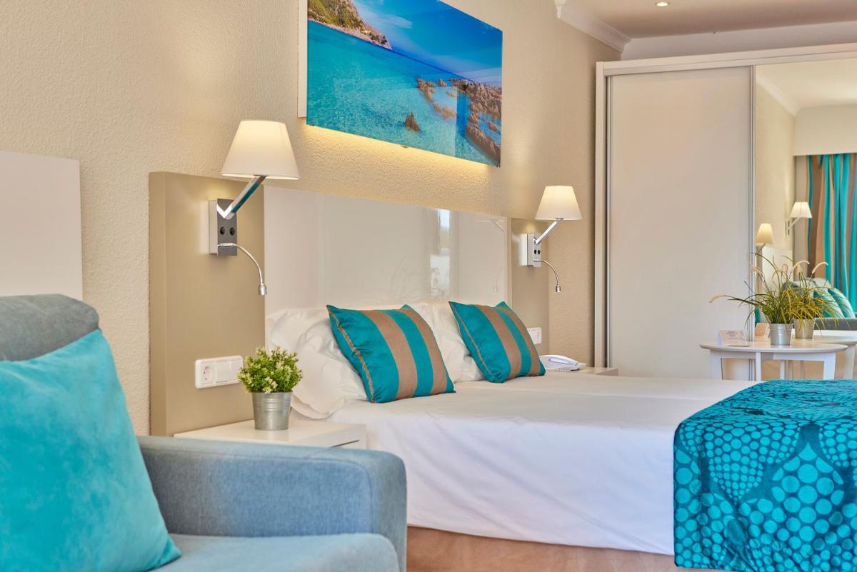 Cama o camas de una habitación en Universal Hotel Lido Park & Spa