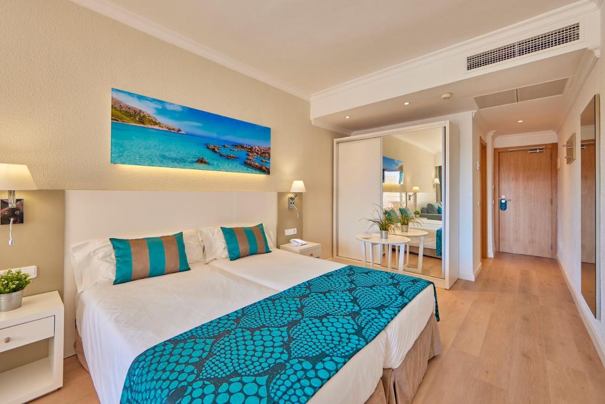 Cama o camas de una habitación en Universal Hotel Lido Park & Spa