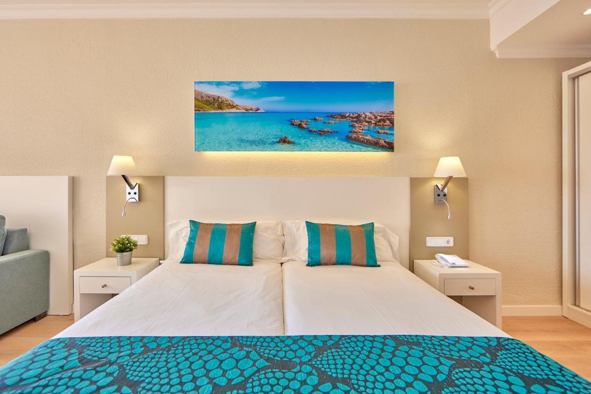 Cama o camas de una habitación en Universal Hotel Lido Park & Spa