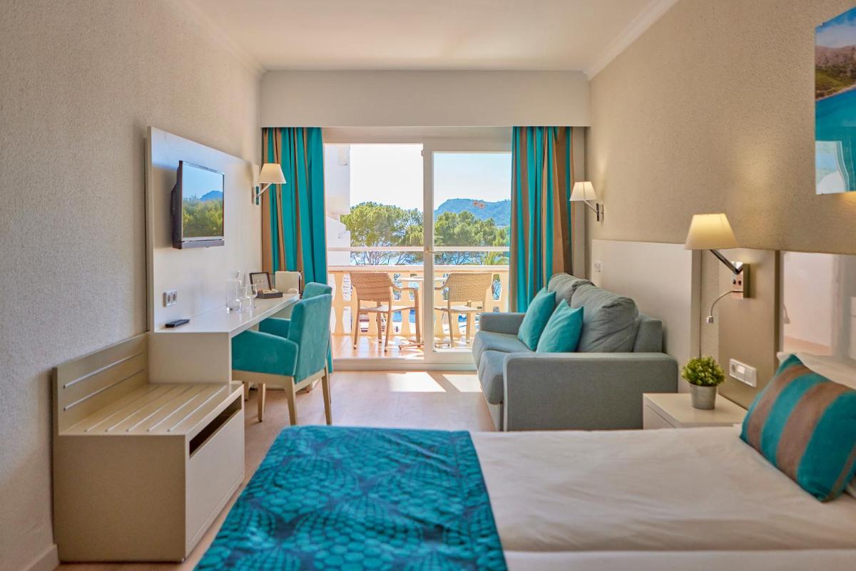 Cama o camas de una habitación en Universal Hotel Lido Park & Spa
