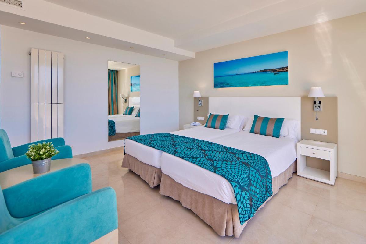 Cama o camas de una habitación en Universal Hotel Lido Park & Spa