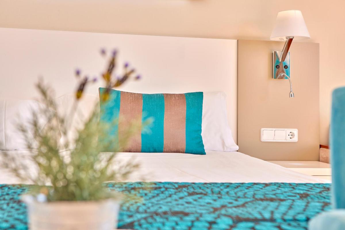 Cama o camas de una habitación en Universal Hotel Lido Park & Spa