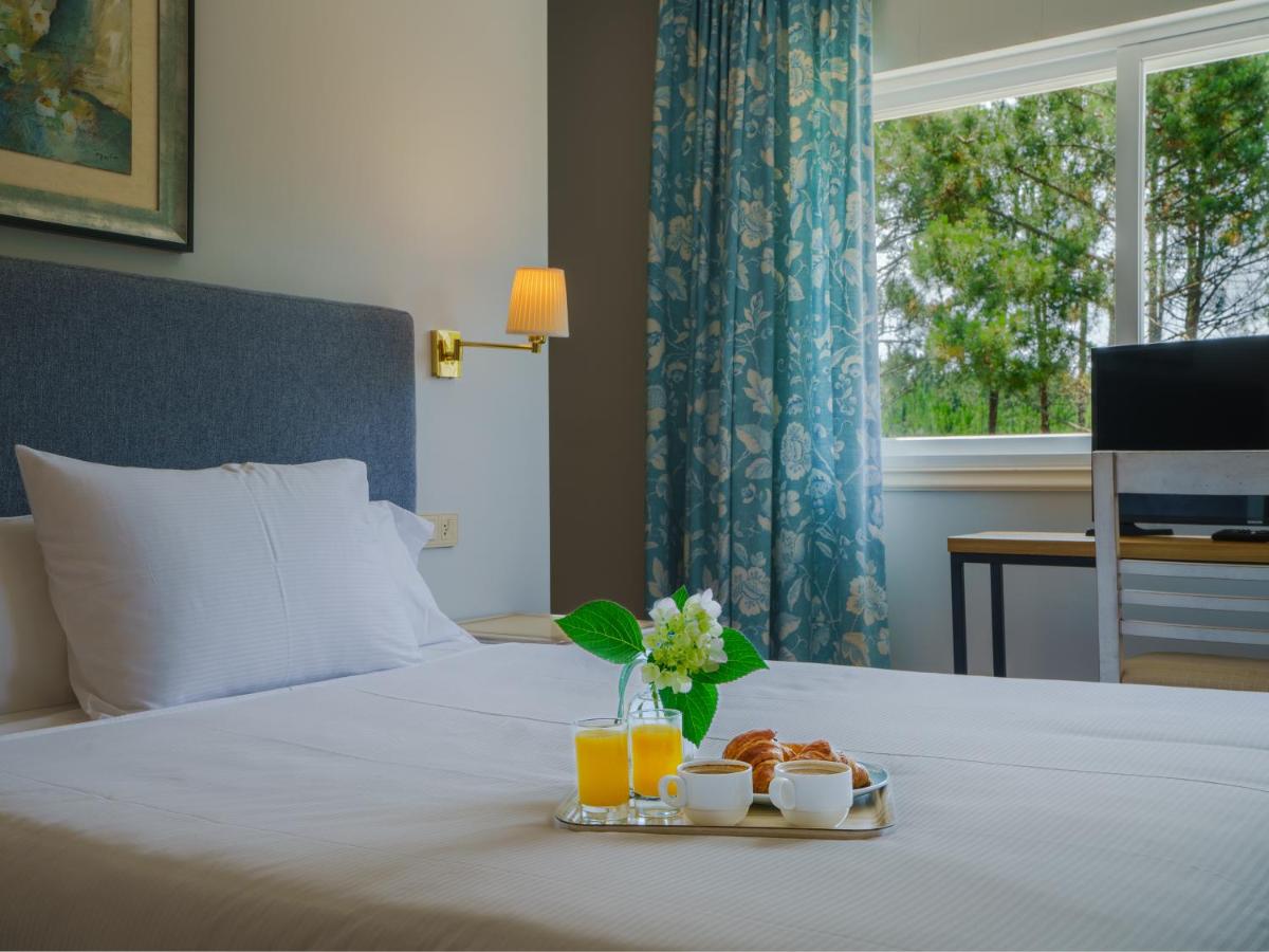 Cama o camas de una habitación en Hotel Spa Atlántico San Vicente do Mar