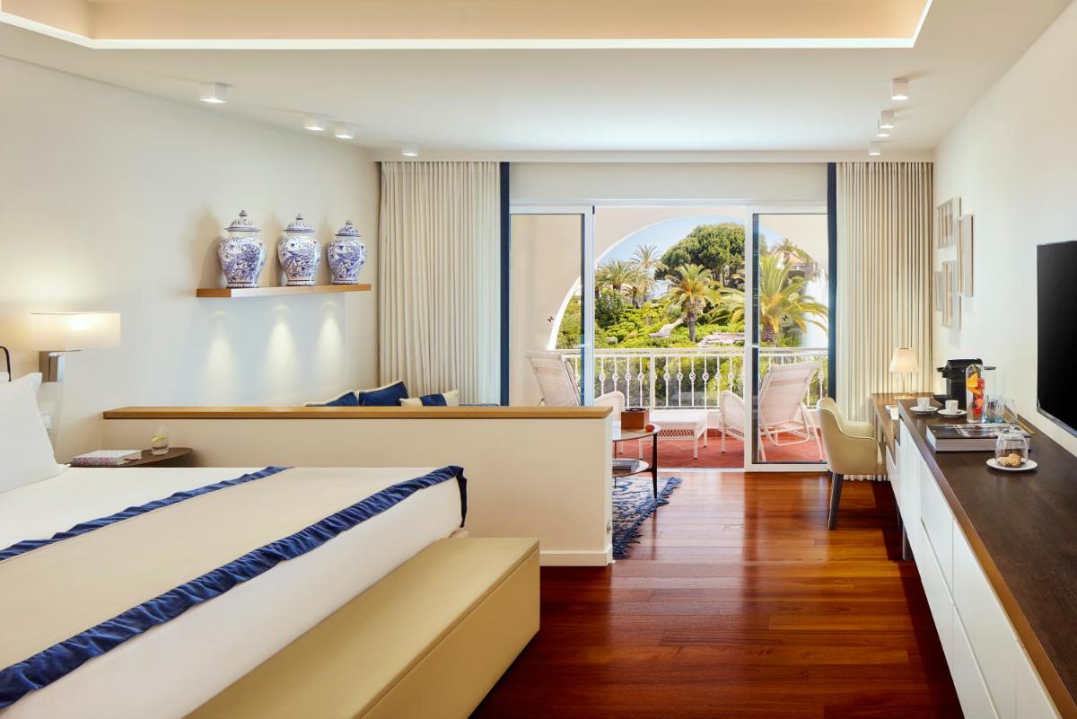 Uma cama ou camas num quarto em Vila Vita Parc