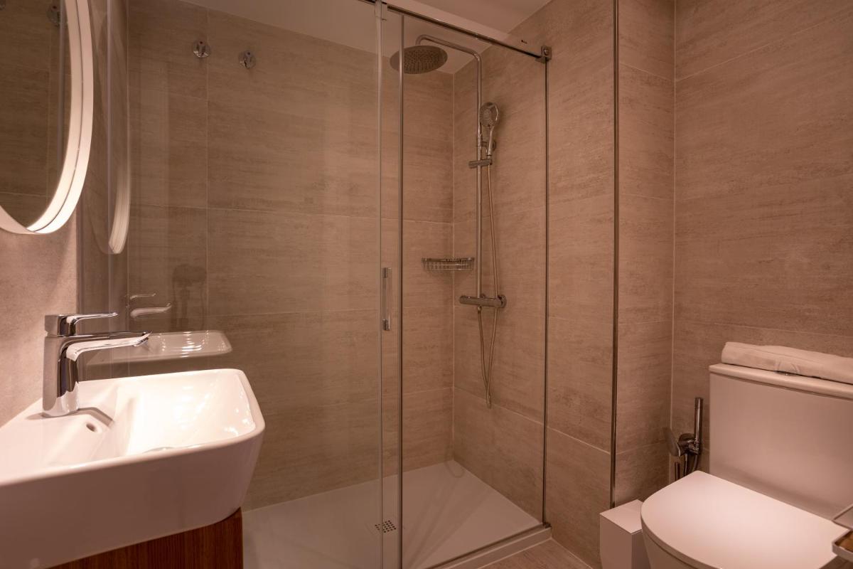 Un baño de Apartamentos&Spa Mundakaport