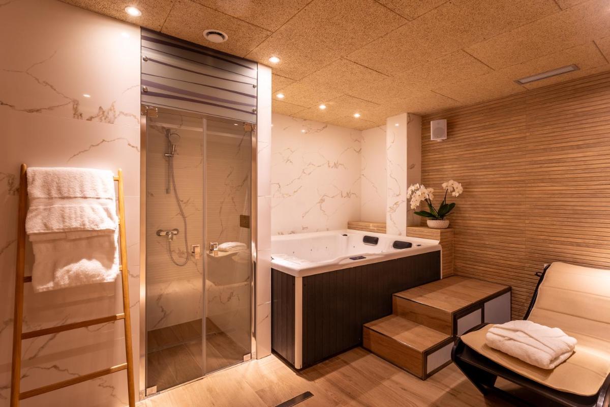 Un baño de Apartamentos&Spa Mundakaport