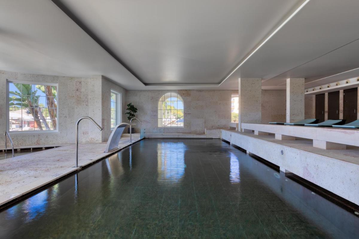A piscina em ou perto de Domes Lake Algarve, Autograph Collection