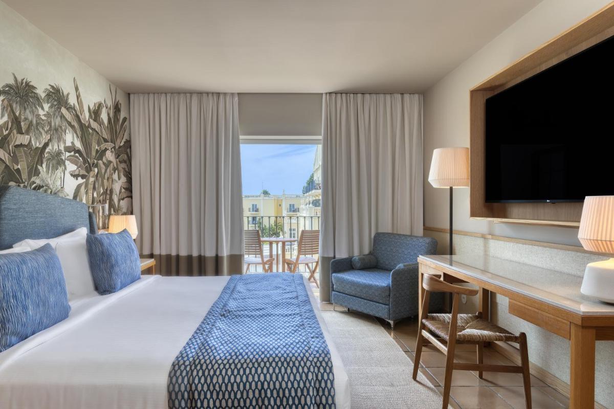 Uma cama ou camas num quarto em Domes Lake Algarve, Autograph Collection