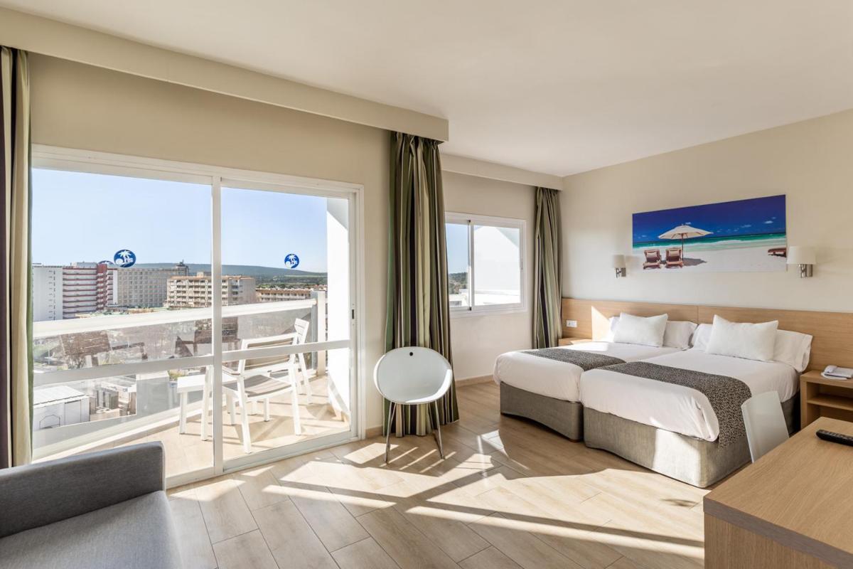 Cama o camas de una habitación en Hotel Samos