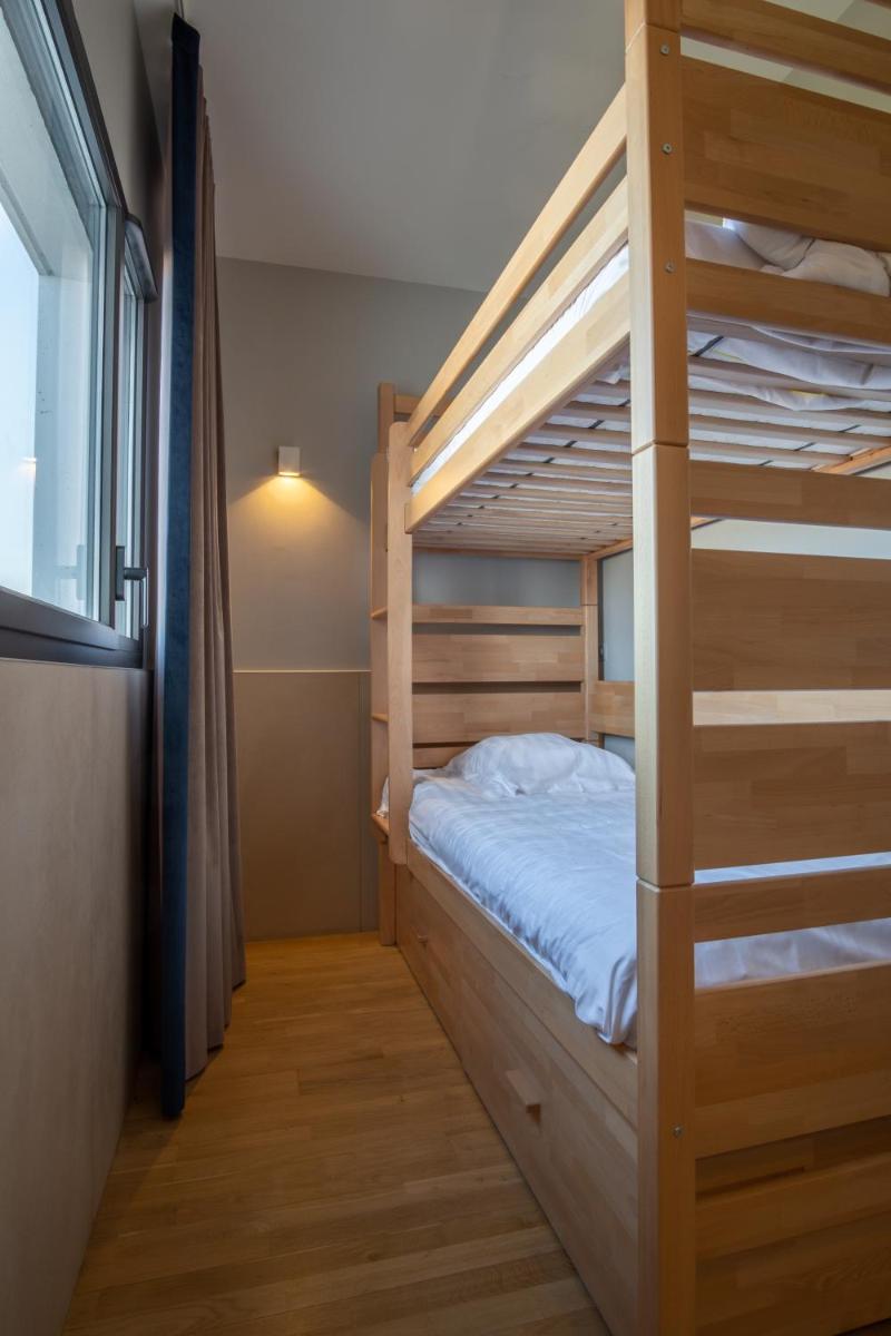 Un ou plusieurs lits dans un hébergement de l'établissement Kyriad Prestige Lyon Est - Saint Priest Eurexpo Hotel and SPA