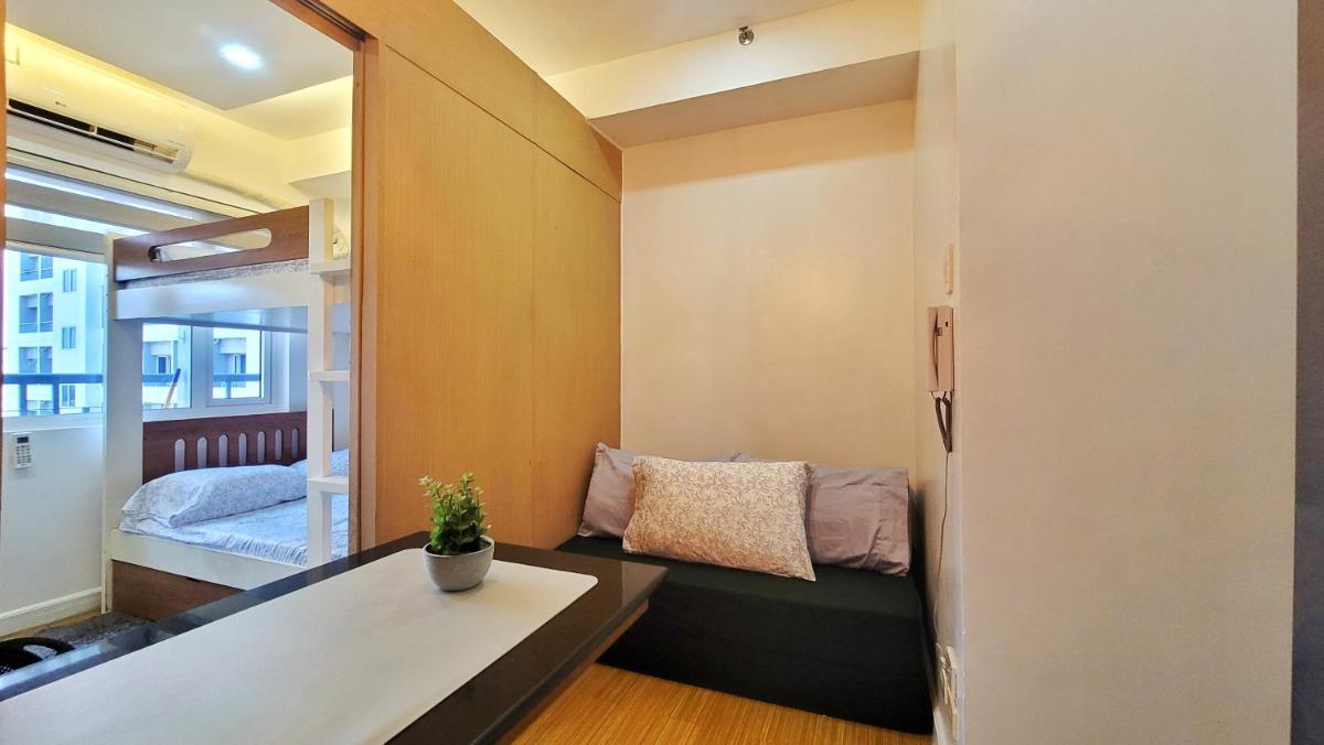 Spacious condo with pool view at Grace Residences, near BGC - Housity