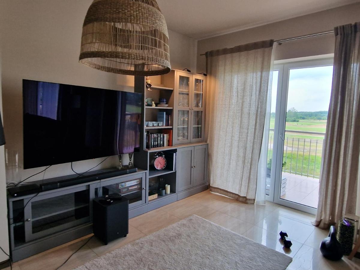 ApartGolf Sobienie Królewskie - Housity