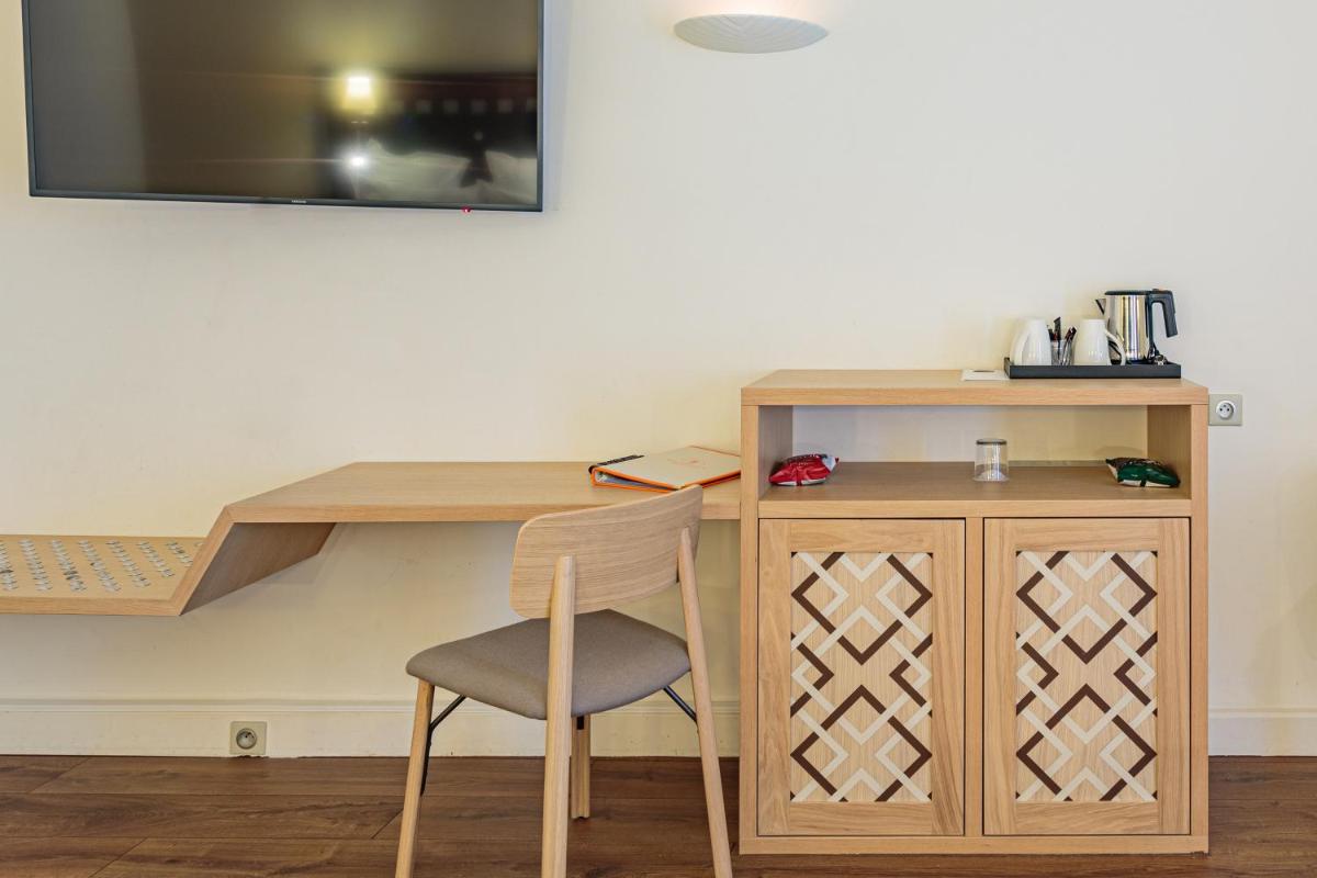 Cuisine ou kitchenette dans l'établissement Grand Tonic Hotel & SPA NUXE