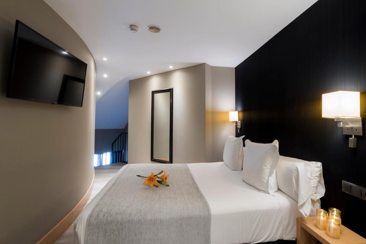 Cama o camas de una habitación en Hotel Plaza