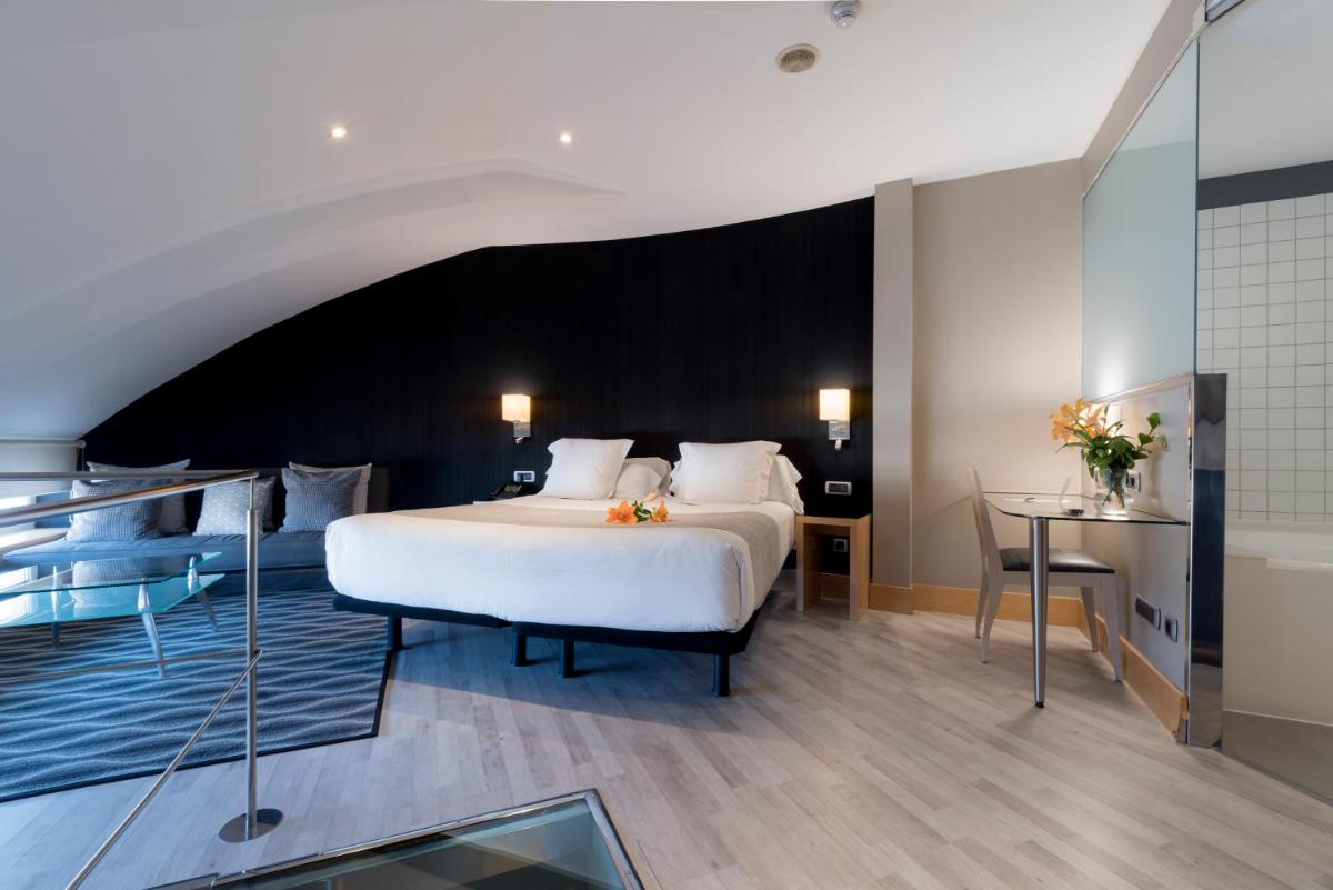 Cama o camas de una habitación en Hotel Plaza