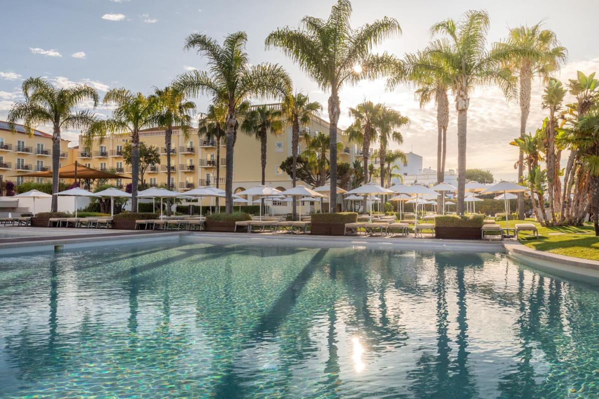 A piscina em ou perto de Domes Lake Algarve, Autograph Collection