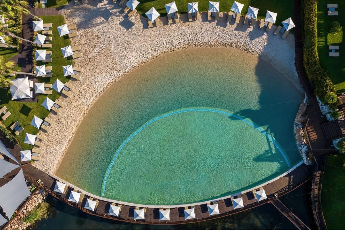 A piscina em ou perto de Domes Lake Algarve, Autograph Collection
