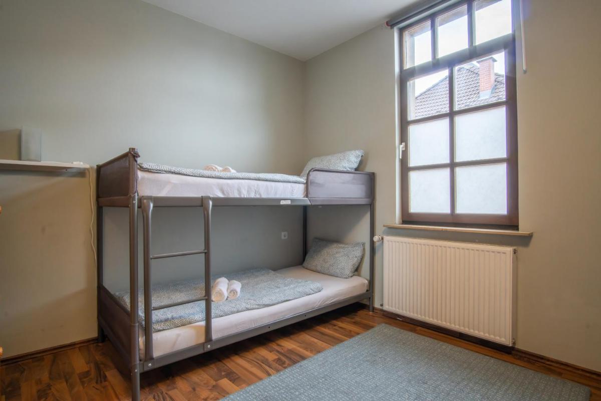 Ein Bett oder Betten in einem Zimmer der Unterkunft Family and Friends Hassloch