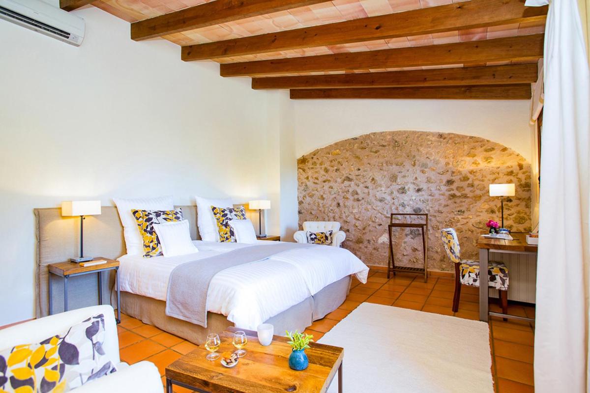 Cama o camas de una habitación en Casa Font i Roig
