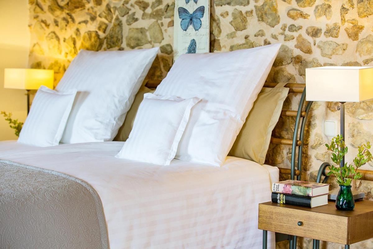 Cama o camas de una habitación en Casa Font i Roig