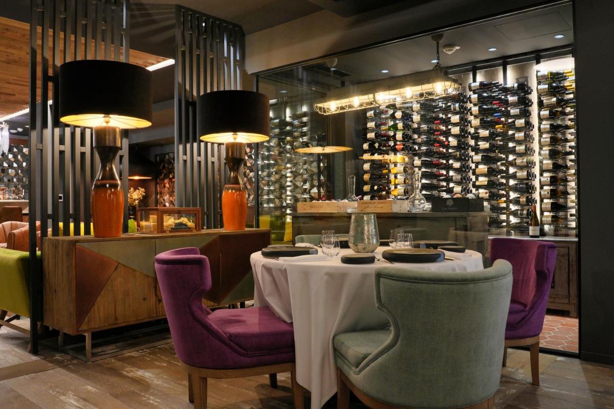 Coin salon dans l'établissement Les Regalia Hôtel & Spa
