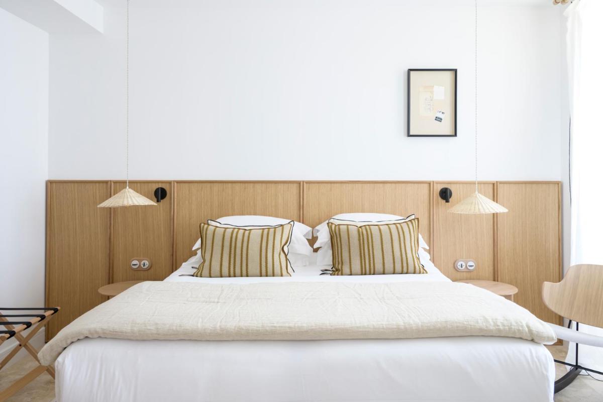 Un ou plusieurs lits dans un hébergement de l'établissement Le Couvent des Minimes, un Hôtel & Spa L'Occitane en Provence