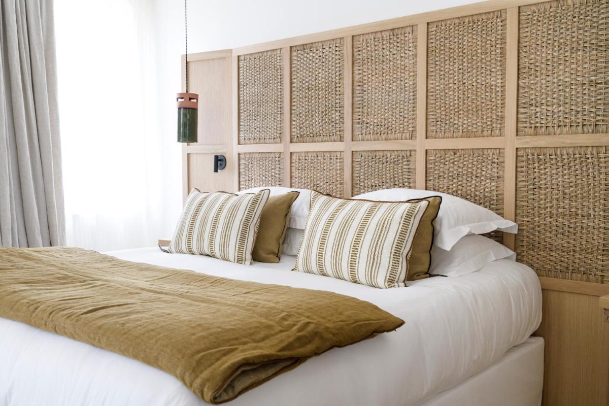 Un ou plusieurs lits dans un hébergement de l'établissement Le Couvent des Minimes, un Hôtel & Spa L'Occitane en Provence