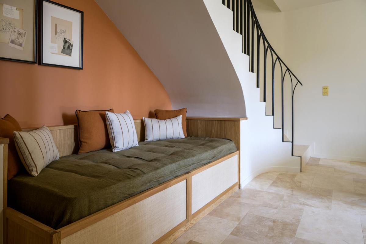 Un ou plusieurs lits dans un hébergement de l'établissement Le Couvent des Minimes, un Hôtel & Spa L'Occitane en Provence