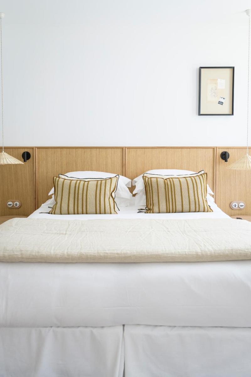 Un ou plusieurs lits dans un hébergement de l'établissement Le Couvent des Minimes, un Hôtel & Spa L'Occitane en Provence