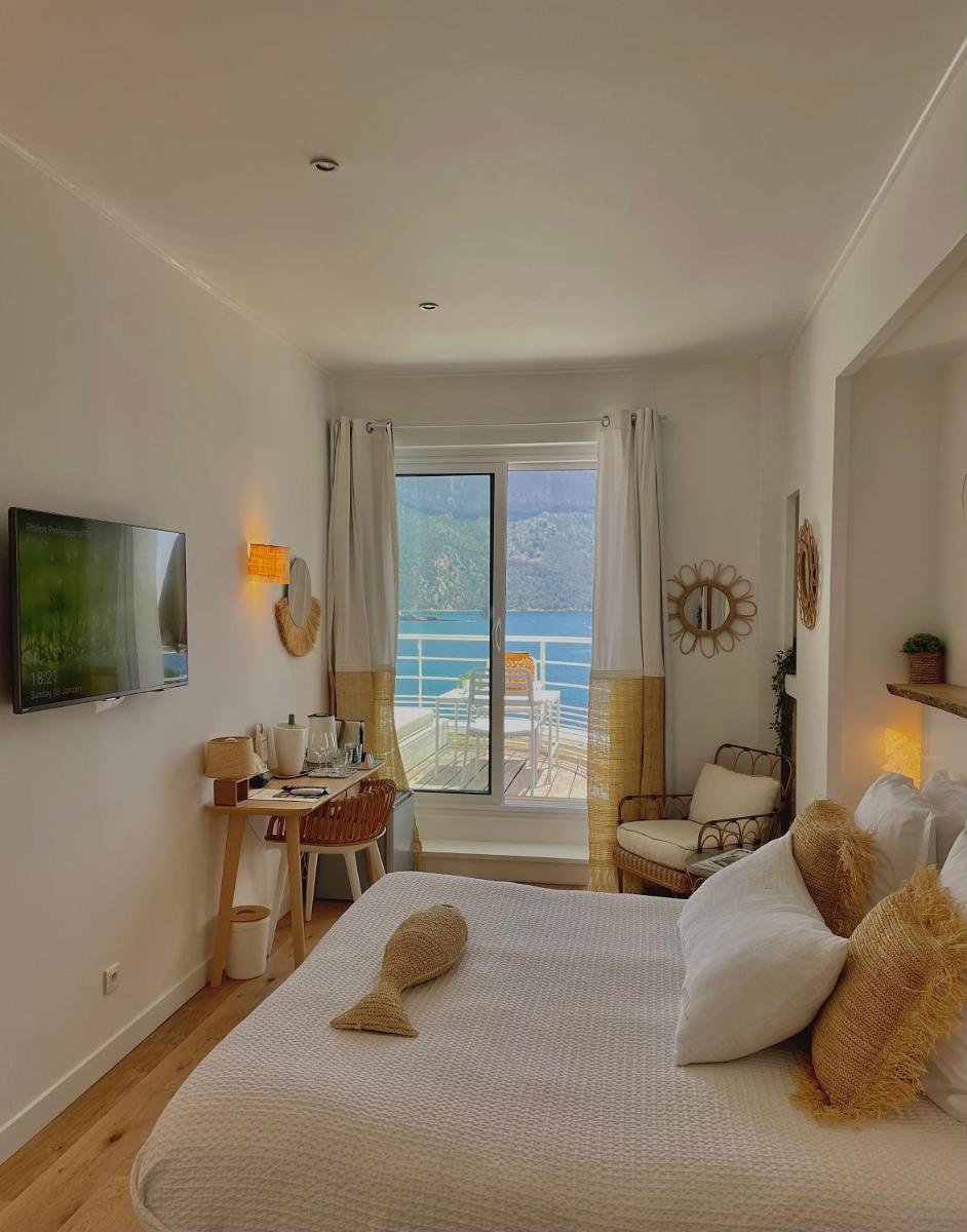 Un ou plusieurs lits dans un hébergement de l'établissement Hotel de La Plage - Mahogany